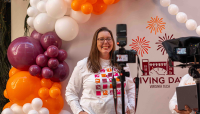 An image of a Hokie filming a Giving Day thank you video