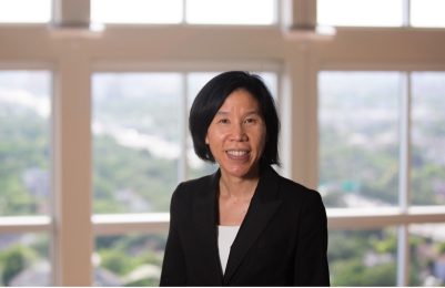 Health economist Vivian Ho in front of a window